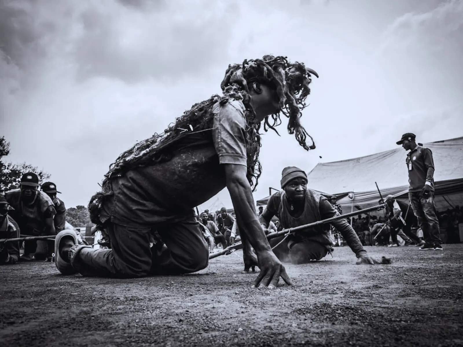 Community gathering showcasing Ham cultural unity with traditional dress and customs
